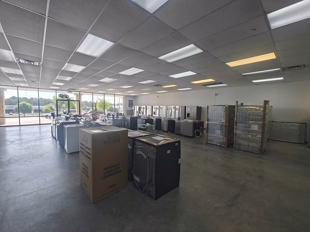Inside the Hoover showroom: rows of appliances under the front windows